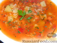 Фото приготовления рецепта: Томатный суп с рисом - шаг №12